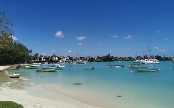 Boats moored in the bay at Grand Baie