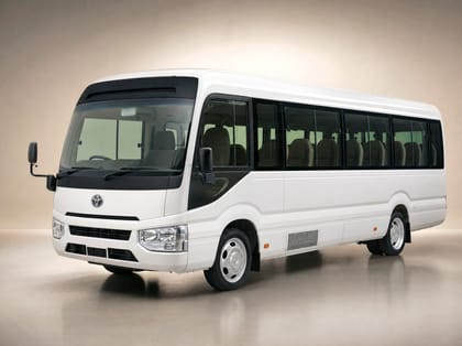 White midi coach used for group transfers